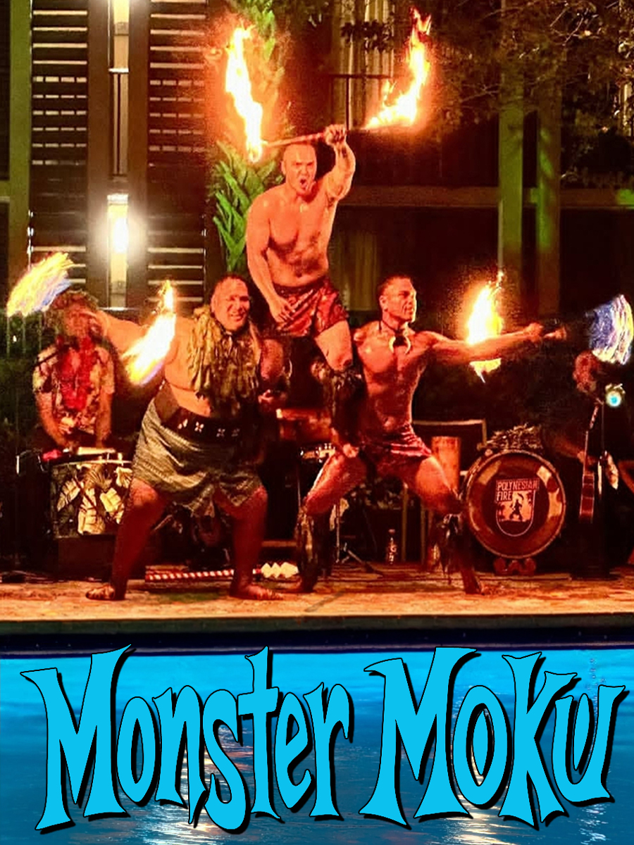 Three fire dancers performing at Monster Moku