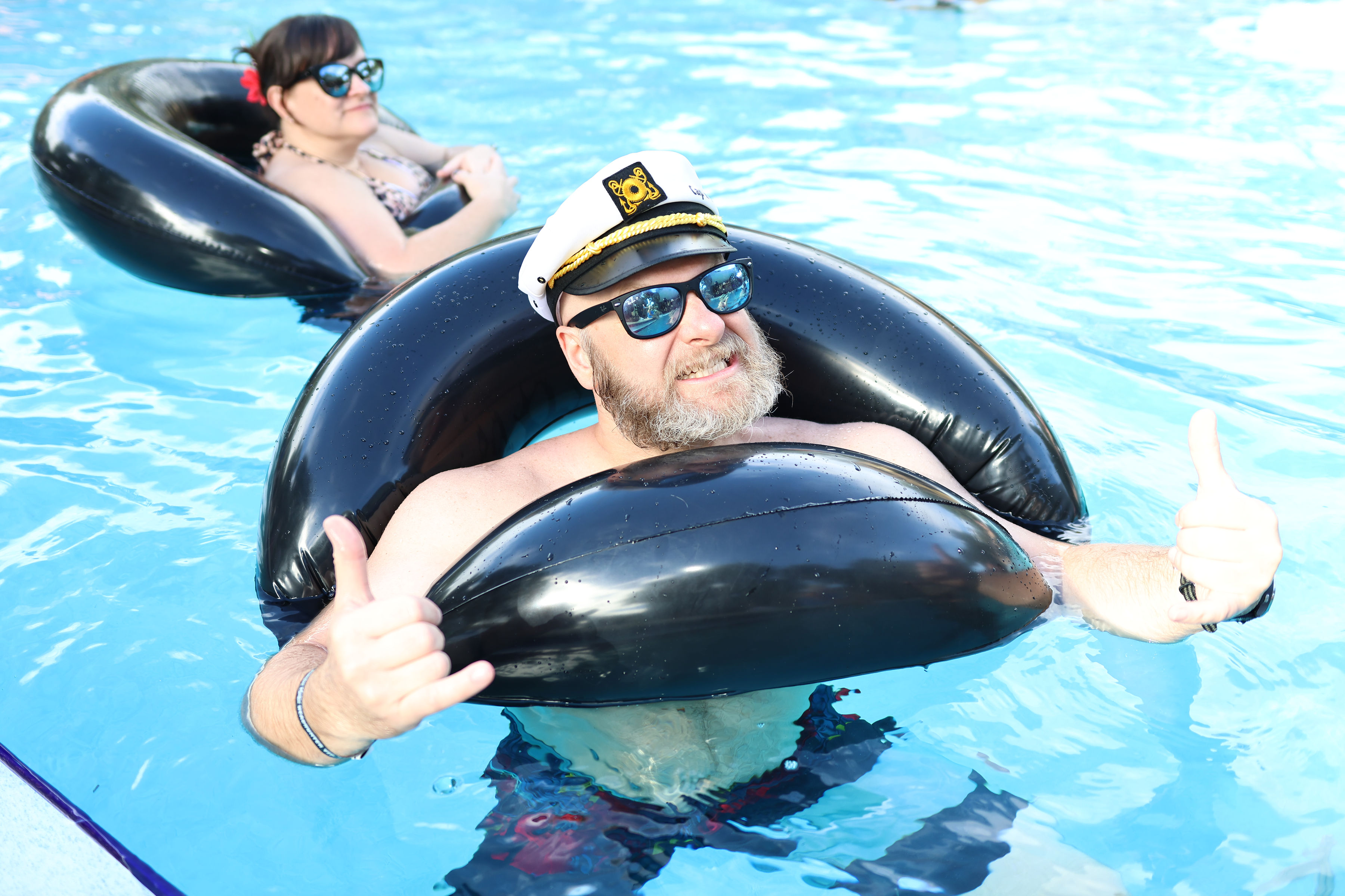 Monster Moku guests relaxing in the resort pool
