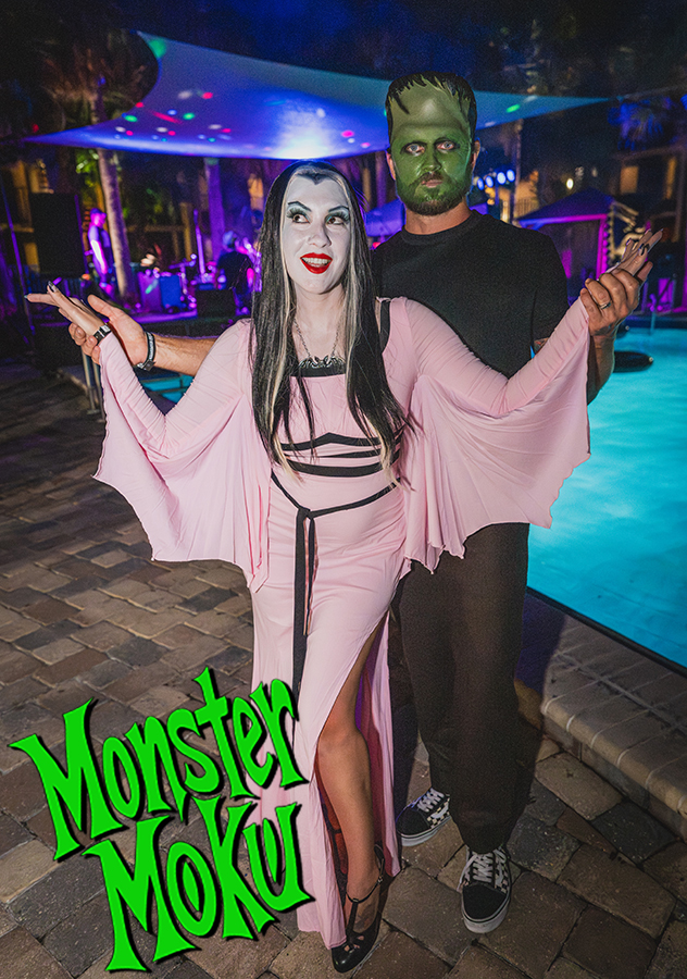 Costumed Monster Moku guests dressed as classic monsters beside the pool
