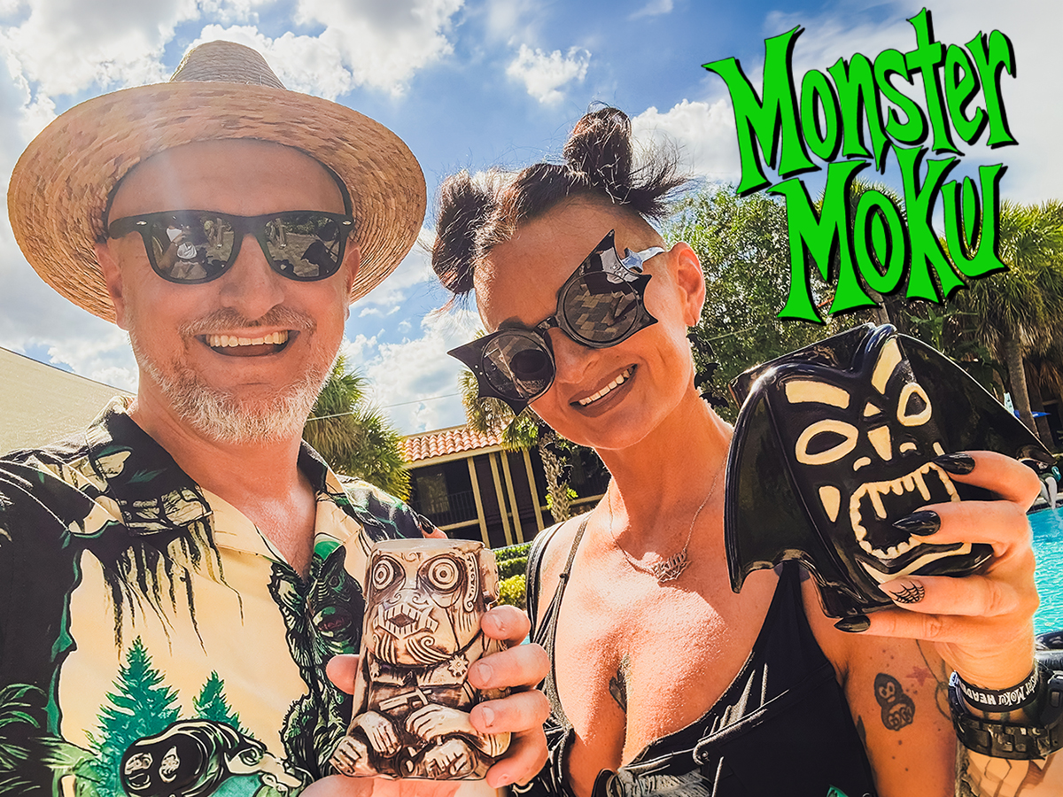 Monster Moku guests showing off tiki mugs